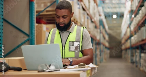 Man, laptop and logistics checklist in warehouse, technology and research on shipping solutions. African worker, pc or email for online order fulfillment in ecommerce or productivity in distribution photo