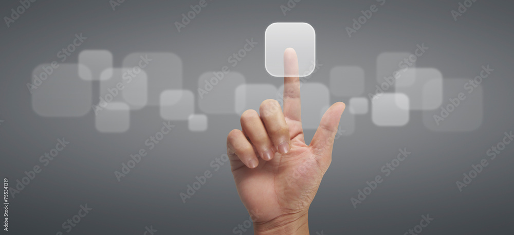 Hand pushing on touch screen interface Hand pushing on touch screen interface