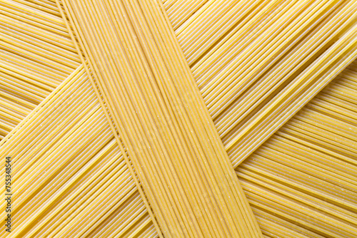 Spaghetti texture. Background texture of pasta. Raw spaghetti close-up.