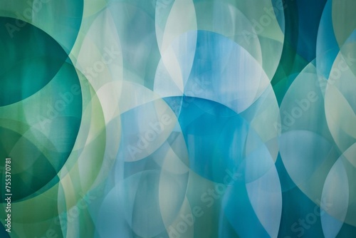 Softly blurred circles and ellipses in cool blues and greens, evoking a calm, serene atmosphere