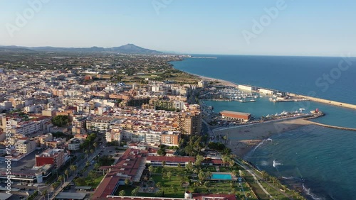 Drone photo of Benicarlo with view of port and residential buildings along sea coast. North of Province of Castello, Spain. photo