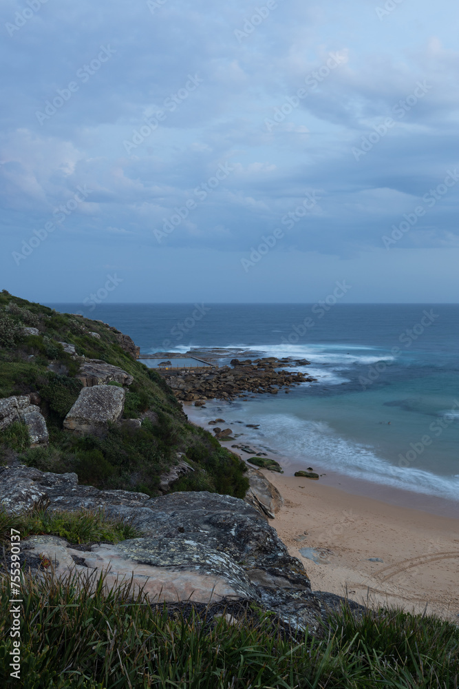 Cloudy view of North Curl Curl rockpool, Sydney, Australia.
