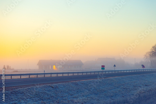 A beautiful foggy morning during early winter. Misty sunrise landscape of Northern Europe.