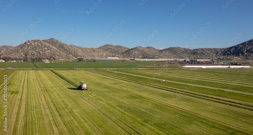 Obraz premium Harvested alfalfa field seen from aerial viewpoint in Menifee southern California United States