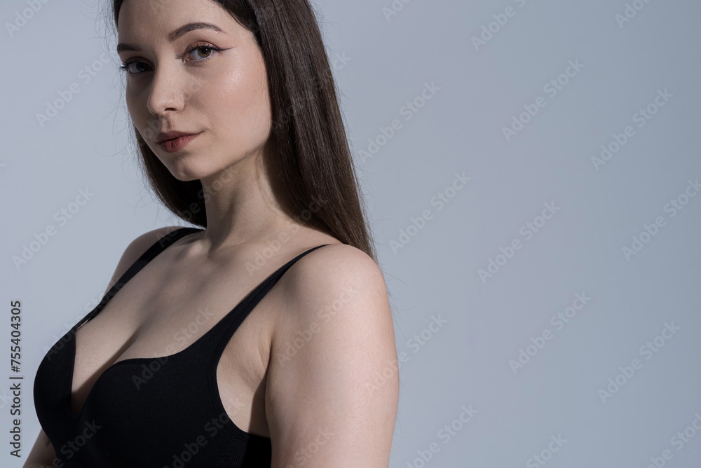 Close-up portrait of attractive sexy Caucasian young brunette woman in studio. Luxury, elegance, fashion. Close-up portrait of attractive sexy Caucasian young brunette woman in studio. Luxury, elegance, fashion.
