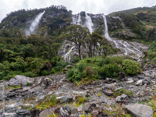 Spectacular views on Lush Native Forest and Waterfalls  Rainy Day Boat Cruise adventure in Milford Sound  New Zealand