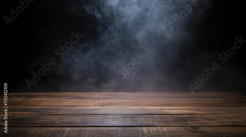 empty wooden table with smoke float up on dark background