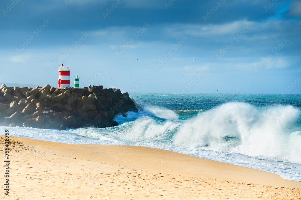 Lighthouses on the shore of Atlantic ocean in Nazare, Portugal.