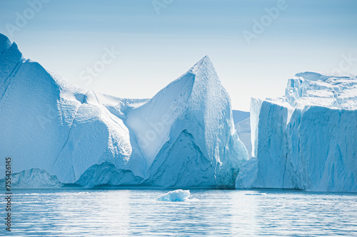 Big icebergs in Atlantic ocean, Ilulissat icefjord, western Greenland.