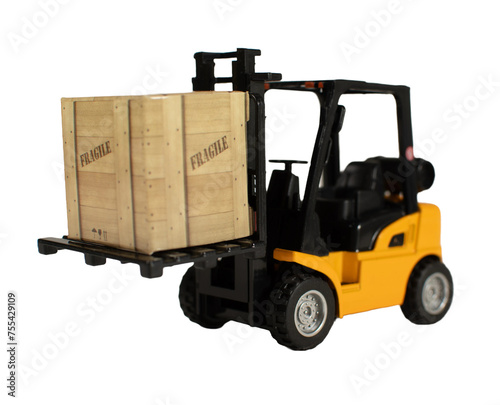 A forklift is lifting a box that says fragile