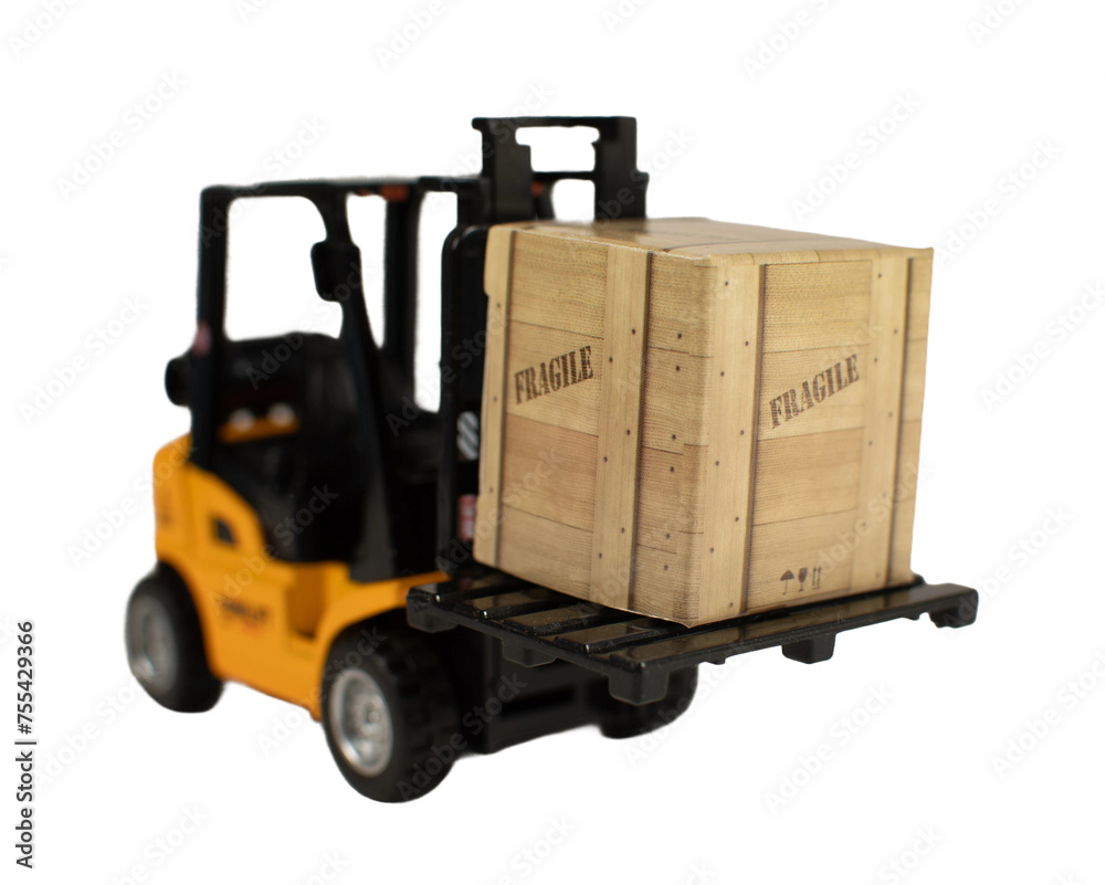 A forklift is lifting a box that says fragile A forklift is lifting a box that says fragile