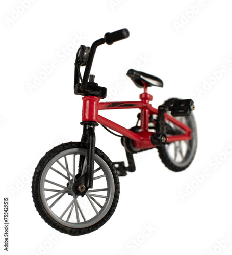 Fototapeta Naklejka Na Ścianę i Meble -  A red bike with a black handlebar and a black seat