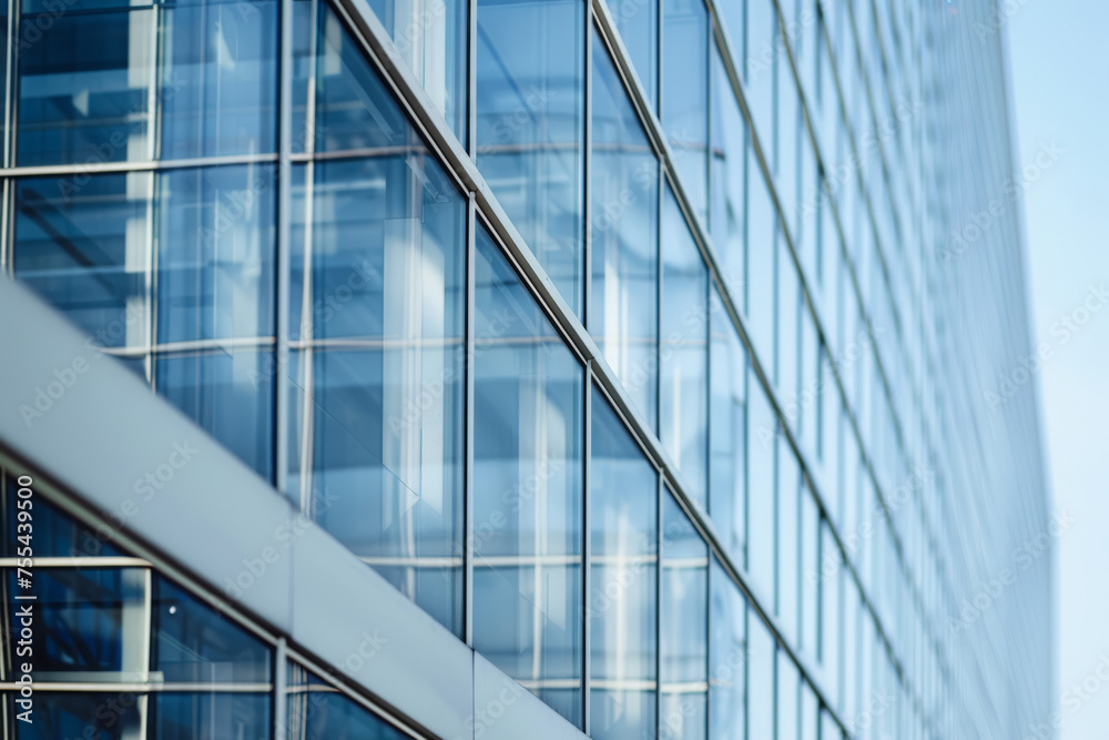 Obraz premium Use a macro lens to capture the intricate details of the sustainable glass building's facade, highlighting its texture and reflectivity.