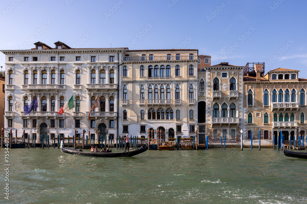Tourists during a Gondola cruise on the Grand Canal in Venice. Italy