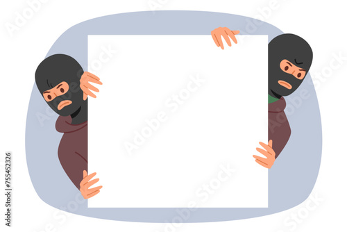 Man bandits in balaclavas hold blank banner with frowning look at screen, offering to place your text on copy space. Two gangster bandits committing robberies or murders and extortion