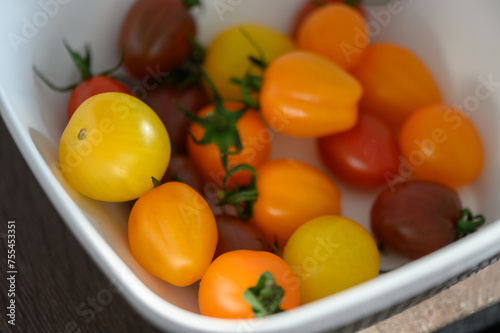 Various colorful cherry tomatoes in a plate 1