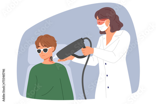 Doctor removes tattoo from man neck using laser medical equipment to clear ink from skin. Process of removing tattoo from guy body to change person image and allow to attend formal events