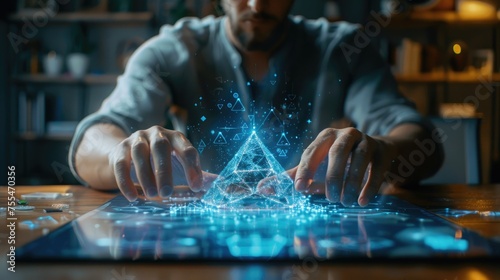 Engineer interacts with a 3D holographic pyramid design