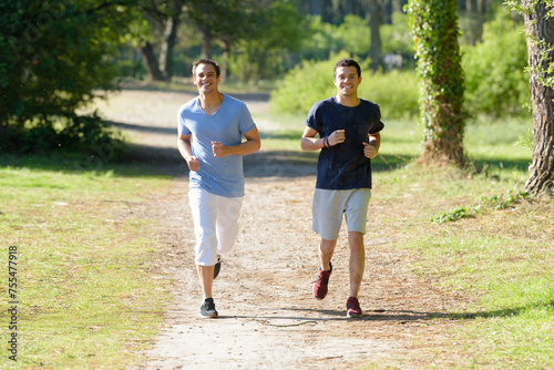 two men friends jogging outdoors