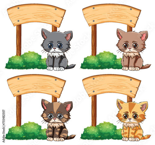 Four cute kittens sitting beside empty signposts.