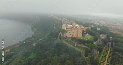 Aerial view of Castel Gandolfo, the residence of the Pope near Lake Albano. A beautiful castle on top of a mountain in the landscape of the city and nature. High quality 4k footage photo