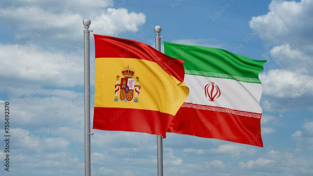 Iran and Spain two flags waving together on blue sky, looped video Iran and Spain two flags waving together on blue sky, looped video