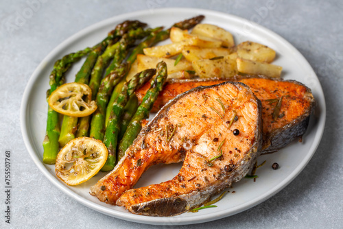 Grilled, baked salmon serve...