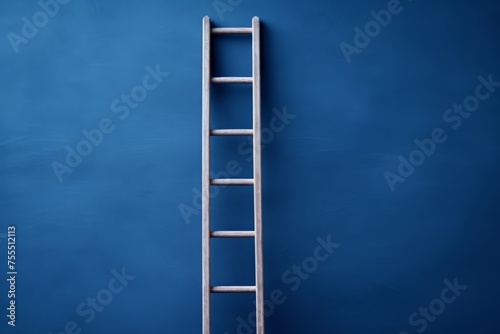 Wooden Ladder Against a Smooth Blue Wall Background