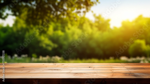 Wooden table on blurred nature background.