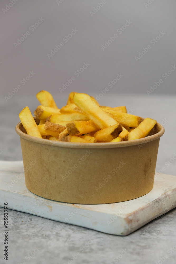 A bowl of takeaway chips A bowl of takeaway chips