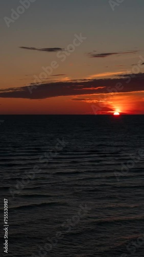 A wonderful sunset over the Baltic Sea on a summer evening. Time lapse