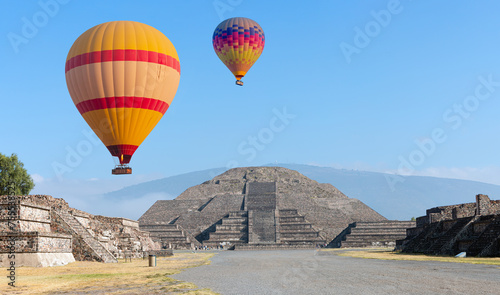Hot air balloon flying over Teotihuacan pyramids complex located in Mexican Highlands and Mexico Valley close to Mexico City. Mexico
