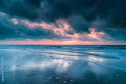 Seascape with dramatic sky and dark clouds above the North Sea © fotografiecor