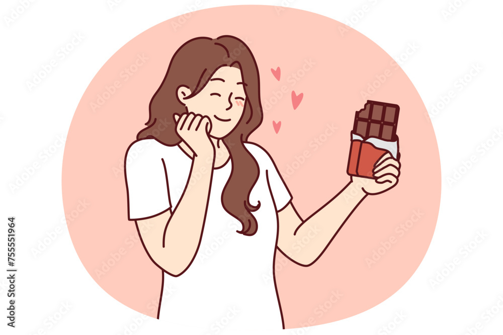 Happy woman enjoying taste of dark chocolate using sweet dessert for snacking and quickly removing hunger. concept of taking milk chocolate with sugar content to fight diabetes and increase insulin Happy woman enjoying taste of dark chocolate using sweet dessert for snacking and quickly removing hunger. concept of taking milk chocolate with sugar content to fight diabetes and increase insulin