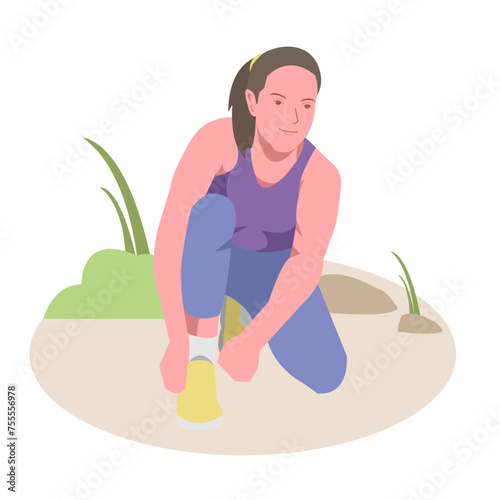 woman adjusting shoelaces while running