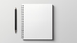 Bloc note blanc sur fond blanc. Mock-up. Papier, cahier, business, travail, bureau. Pour conception et création graphique.