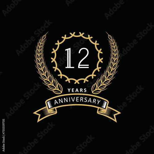 12st anniversary logo with gold and white frame and color. on black background photo