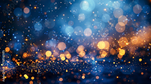 Festive background. Falling small round pieces of gold foil, glowing circles of different sizes on blue blurred bokeh background. Holiday, celebration, Christmas, New Year, Valentine’s Day. Copy space photo