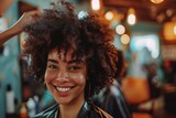 black In a vibrant salon, a joyful hairdresser styles a smiling woman's voluminous afro hair, both exuding satisfaction and happiness in a modern beauty care setting. 