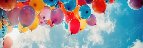 colourful balloons in blue sky banner photo