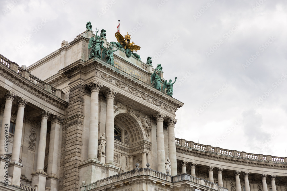 Vienna, Austria. Hofburg Palace on cloudy sky background, time to travel concept