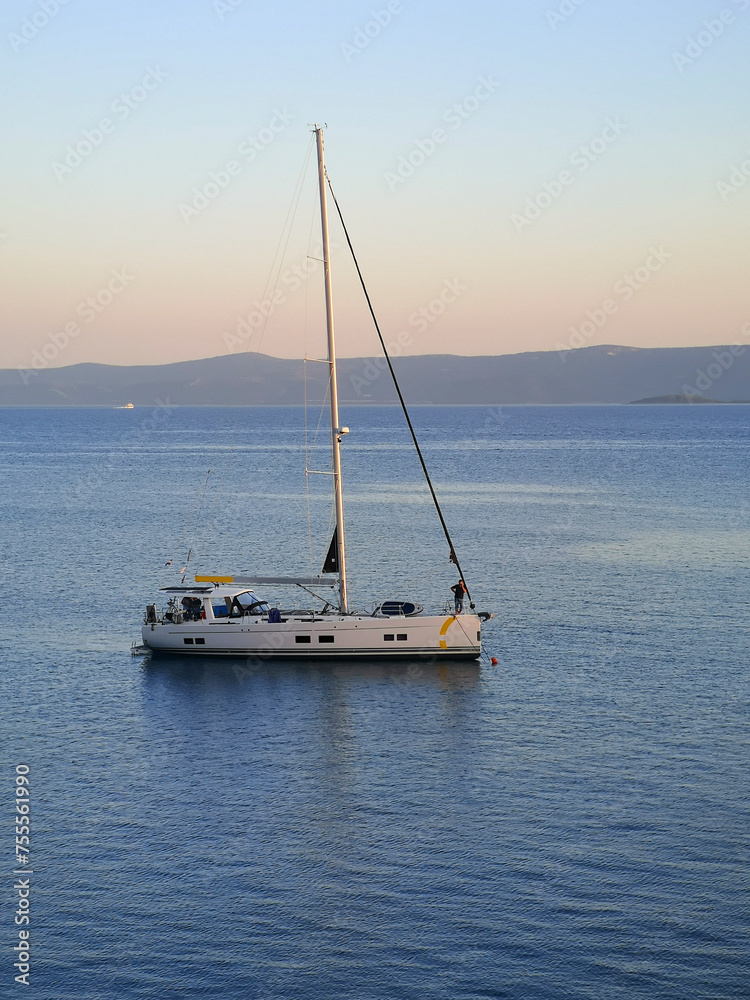 Sailboat moored at the coast of Brac, Croatia.