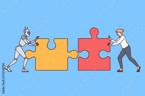 Teamwork of robot with artificial intelligence and person connecting puzzles to create innovative project. Businesswoman uses robot assistant to increase productivity at work and achieve high results.