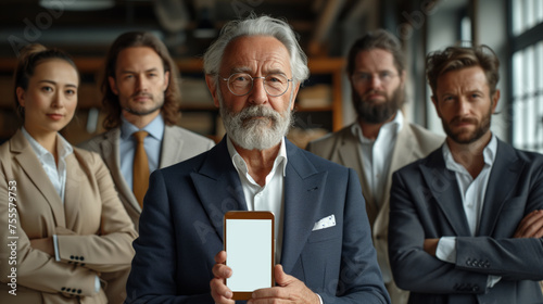 senior businessman holding smartphone with blank screen