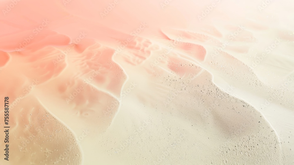 Fototapeta premium A gradient background from coral to ivory with a fine sand texture