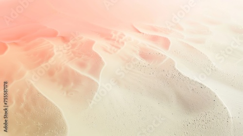 A gradient background from coral to ivory with a fine sand texture