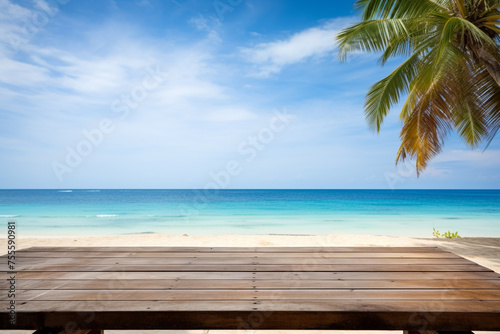 Wood table top on blur beach background used for display or montage your products, travel and relax activity concept © Tommyview