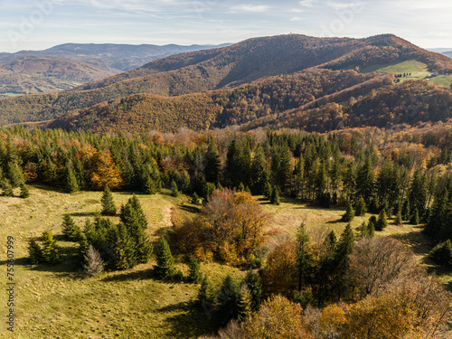 Fototapeta Naklejka Na Ścianę i Meble -  Polish hill mountains beskidy. Autumn i beskid mountains. Wielka Czantoria and Mala Czantoria hill in Beskid Slaski mountains in Poland. Beskid mountains during late autumn day with clear sky.