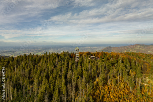 Fototapeta Naklejka Na Ścianę i Meble -  Polish hill mountains beskidy. Autumn i beskid mountains. Wielka Czantoria and Mala Czantoria hill in Beskid Slaski mountains in Poland. Observation tower in the mountains during late autumn day.