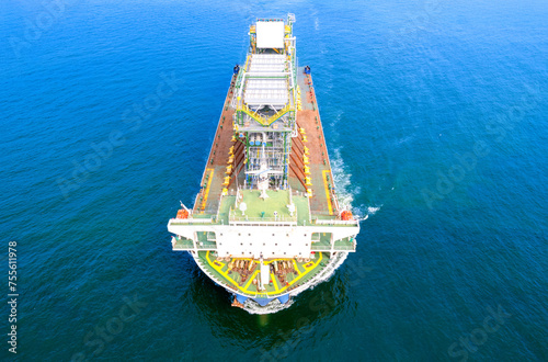 Top view Logistics and transportation large cargo ship Transporting loads of oil rig parts  Oversized cargo transportation